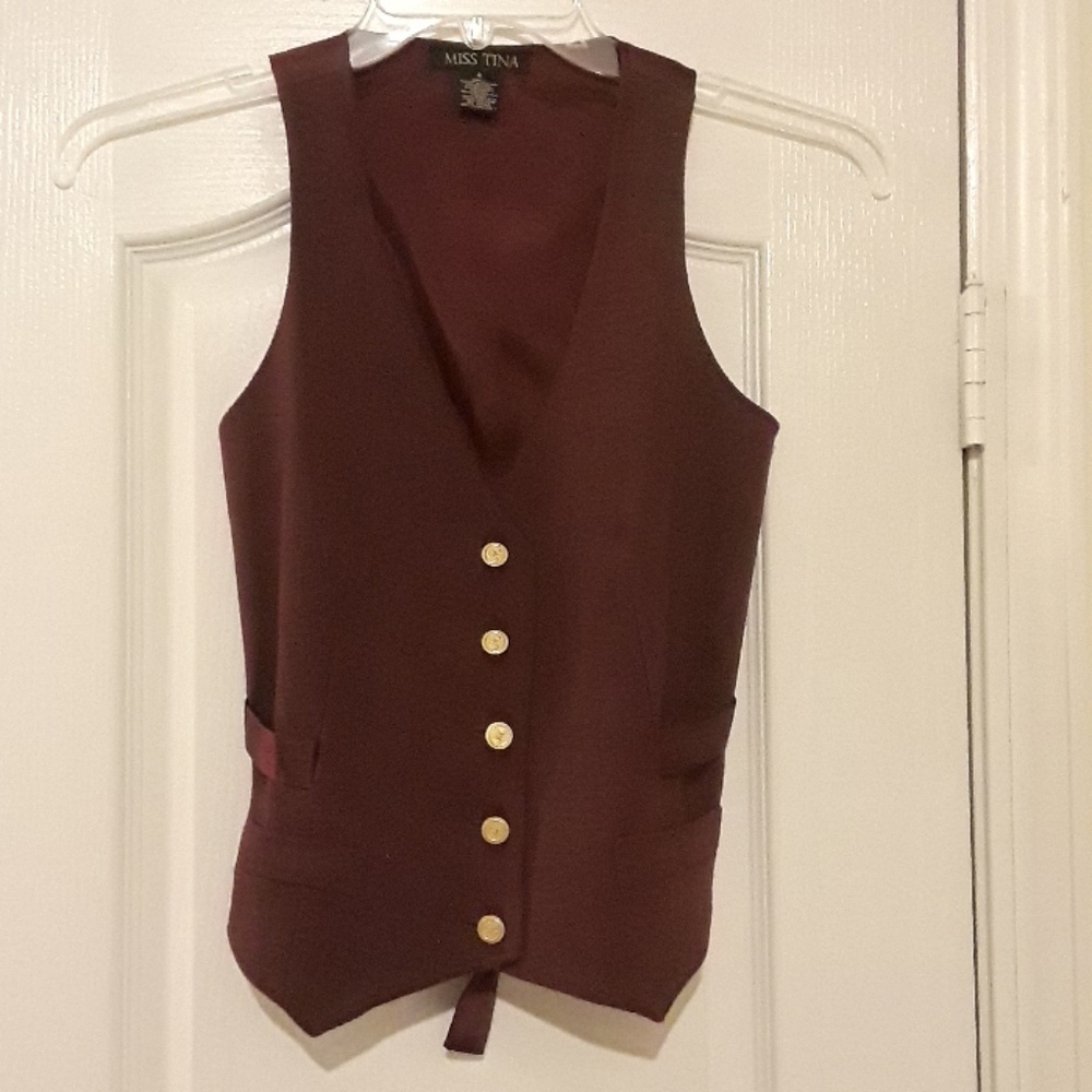 Maroon vest.